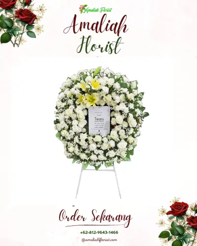 Krans Bunga Duka Cita di Karang Berombak
